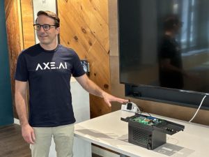 Brett Ewing explains Sticker Heist at Hack Dayton meetup.